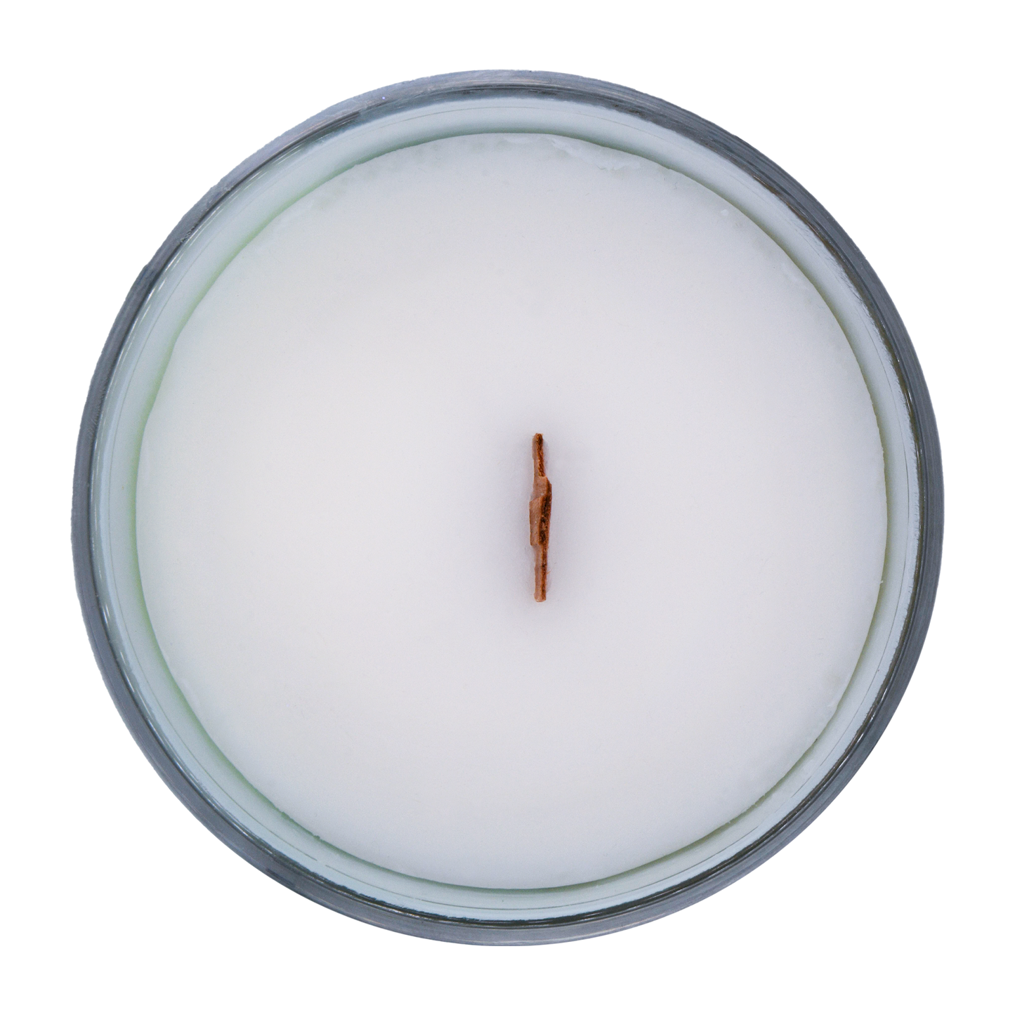 Top view of a scented candle in an iridescent jar with a wooden wick labeled "North Shore" with notes of teakwood and jasmine.