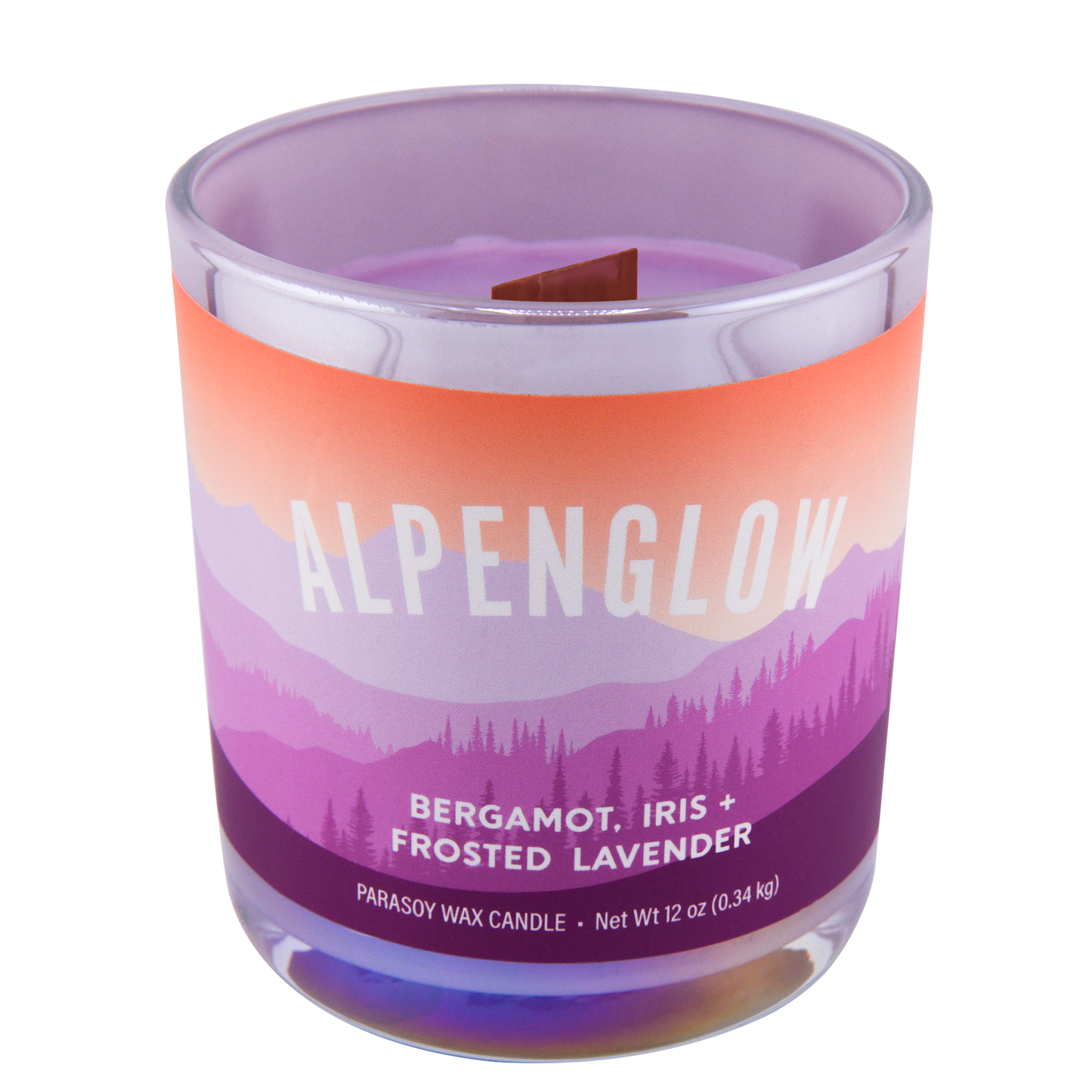 A scented candle labeled "Alpenglow" and scented notes of bergamot, iris, and frosted lavender, in a clear glass jar with a purple to orange gradient design.