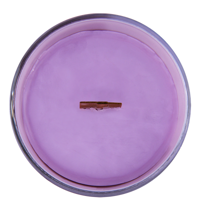 Top view of Alpenglow candle with wood wick—purple refill insert scented with bergamot, iris, and lavender.