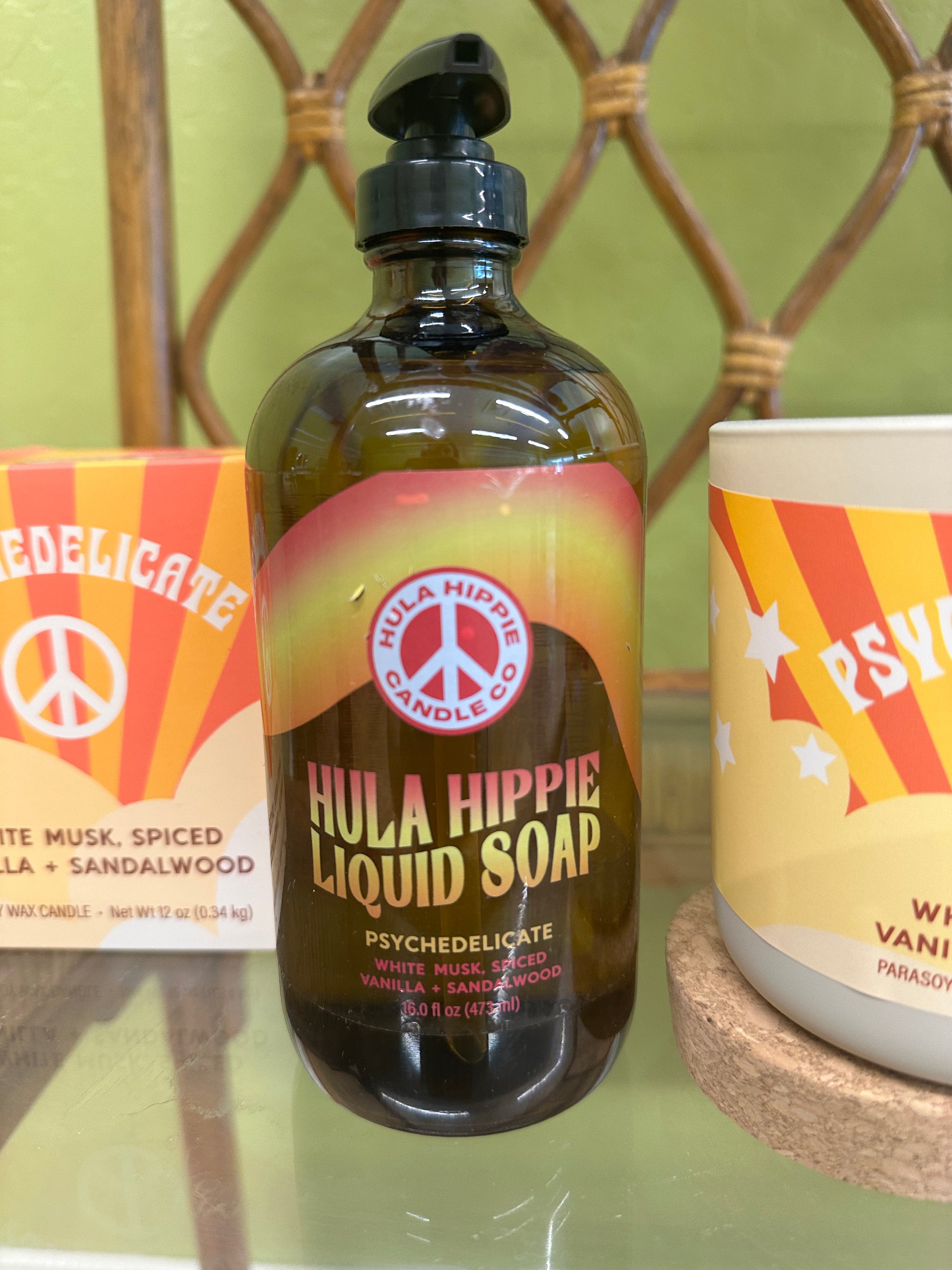 16oz pump-able liquid soap from Hula Hippie Candle Co. Wavy stripe logo. Scented with White Musk, Sandalwood, Spiced vanilla. 